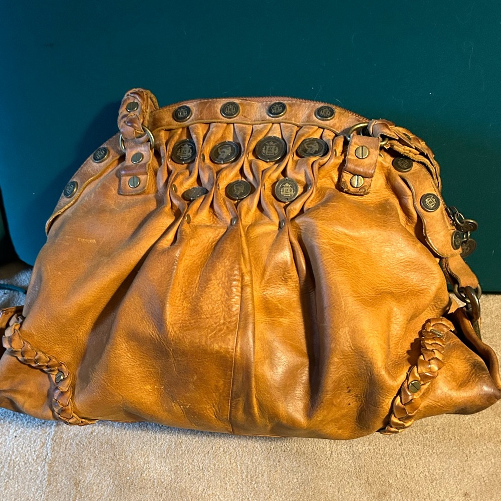 Preloved G Series Tan Leather purse with old gold coin design.